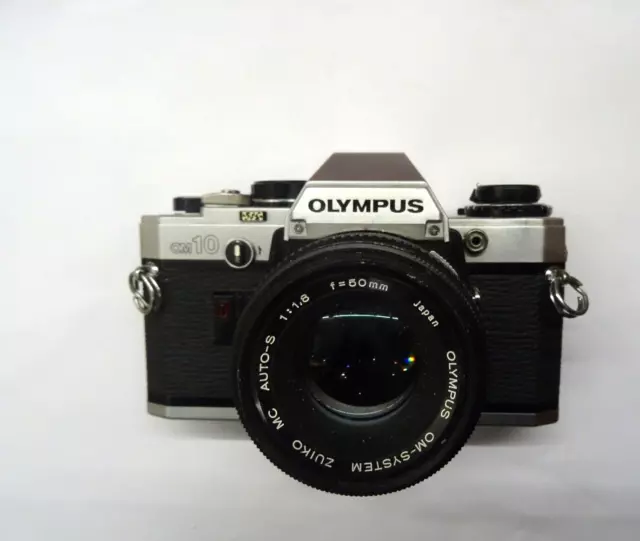 Olympus OM 10 Film Camera & 50mm F1.8 en l'état