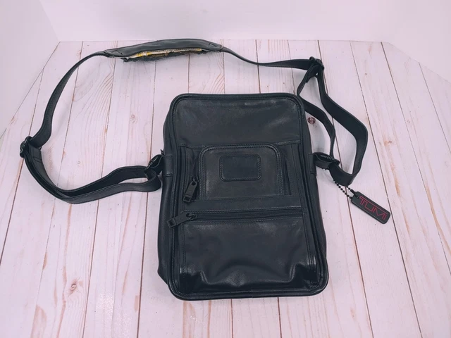 TUMI Leather Crossbody Sling Bag Multiple Pockets and Strap See Details