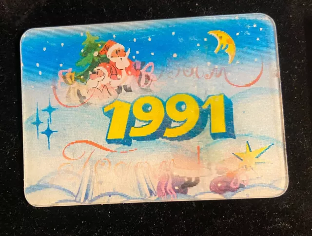 VINTAGE 3D Stereo Lenticular plastic 1991 Christmas pocket Calendar. SANTAS.