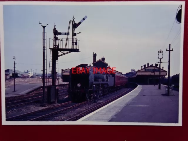 Photo  Sr West Country Loco No 34036 Westward Ho At Basingstoke Railway Station