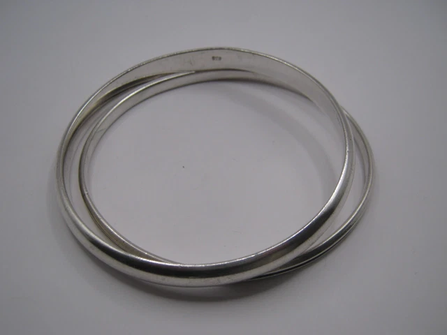 Zwei vintage Armreifen  aus 835 Silber mit Punzen