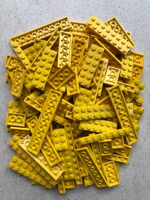 Lego: Lot de 100 Plaques en Jaune classiques et de toute dimension.
