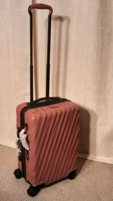 NWT TUMI International Expandable 4 Wheel Carry On in Rosewood $750.