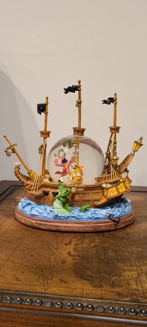Disney PIRATES OF THE CARIBBEAN Musical Snow Globe Plays You Can Fly Peter Pan