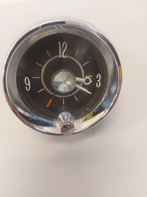 1963 1964 Cadillac Clock with Chrome Housing Bezel Dash Trim 1963 1964 Cadillac Clock with Chrome Housing Bezel Dash Trim
