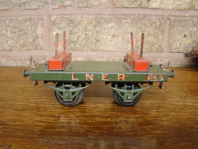 A Hornby O gauge Trolley Wagon RS684, Gas Cylinder Wagon RS662, Lumber