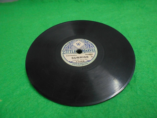 78s RECORD THE LITTLE MARVEL  WOOLWORTHS  SUNRISE & CHARMAINE. 5.5 inches wide.