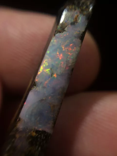 10.2tcw Australian Boulder Opal - bright reds.green 28mmx6.5mm