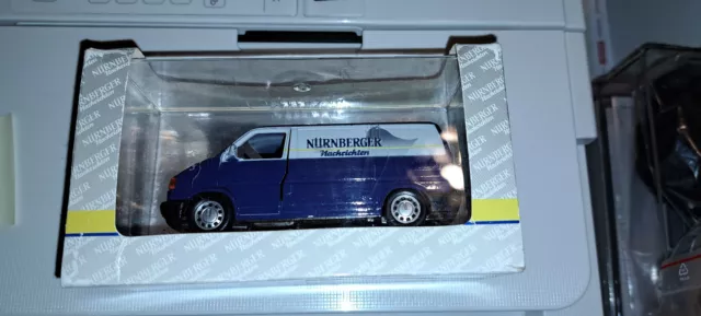 Modellauto VW T5 Bus Transporter Werbung Nürnberger Nachrichten in OVP 1:43