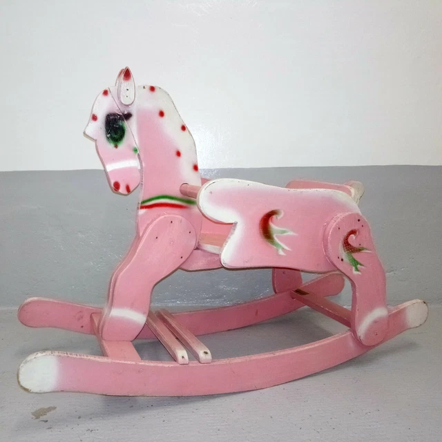 Cheval bascule rose outlet