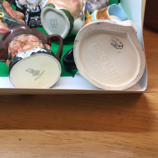 A collection of 10  toby jugs To Hand-Painted Toby Jugs￼ 2