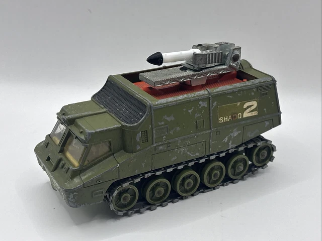Dinky Shado 2 diecast model in blue with missile, showing paint chips