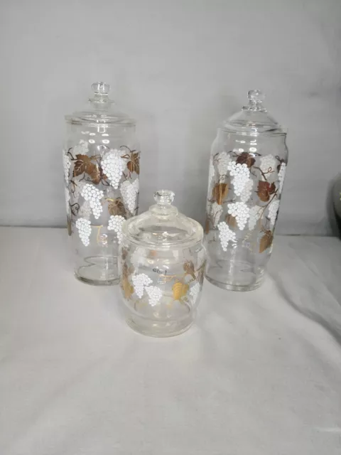 Set of 3 Vintage Apothecary jars with lids clear with white grapes/gold leaves
