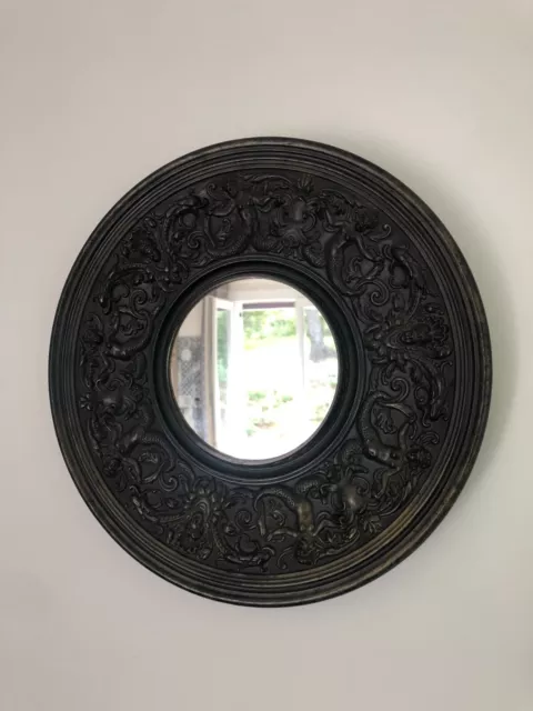 Miroir soleil œil de sorcière en terre cuite vernissée décor baroque