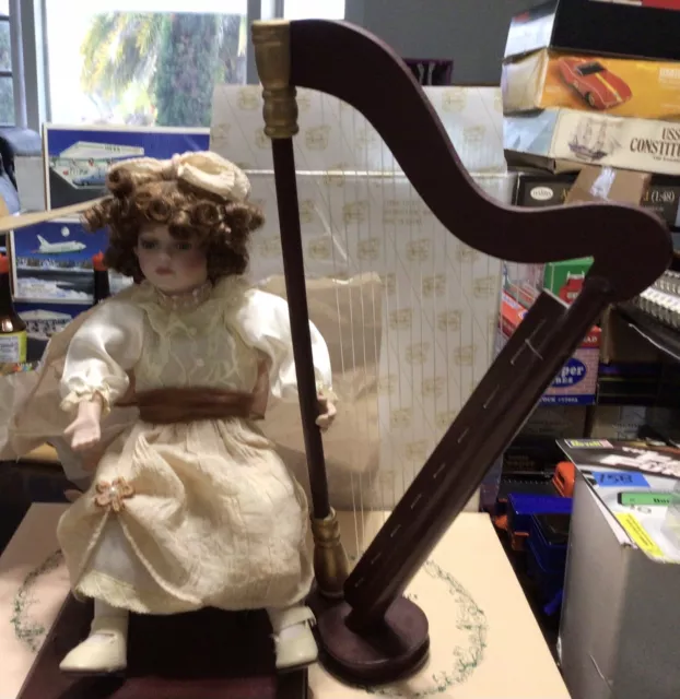 Musical Mallory with Harp Porcelain Doll By Heritage Signature Collection New