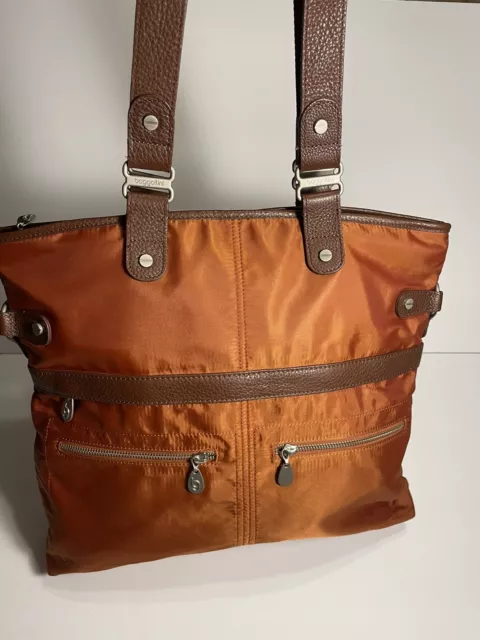 Baggallini Rust Burnt Orange travel Bag tote Purse With Brown Leather Handles