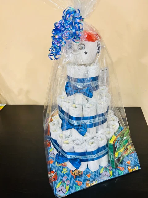 It’s a boy!- Diaper cake with lots of baby essentials. Cute and useful!
