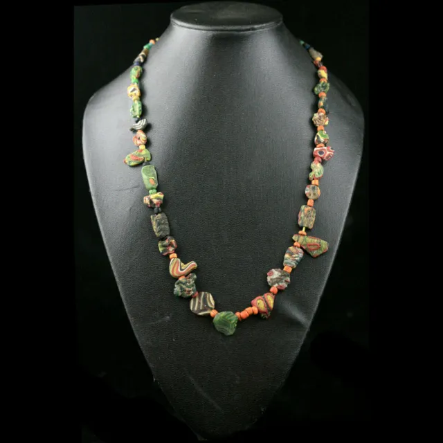 An ancient mixed glass bead necklace, Levant