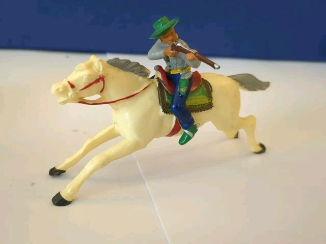 RARE ancien jouet en tôle mécanique cavalier / cow-boy à cheval