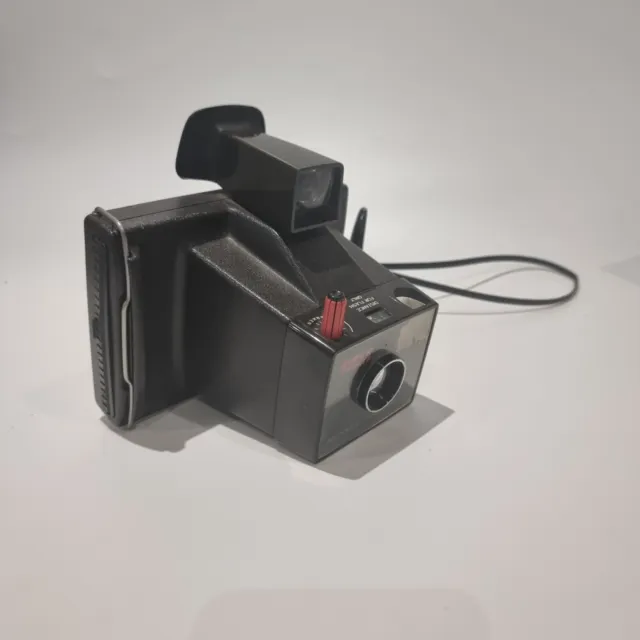 Cámara terrestre Polaroid vintage - súper swinger con correa de mano