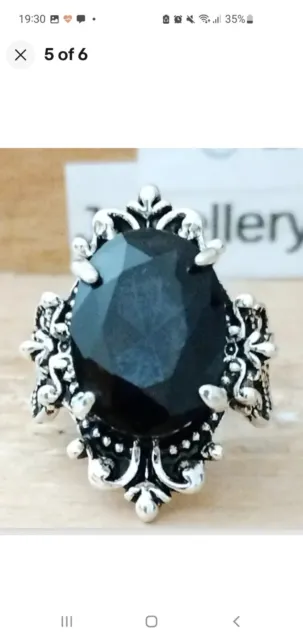 CB: 825 Antiqued Silver Ring. Size T1/2. Large Simulated Oval Obsidian