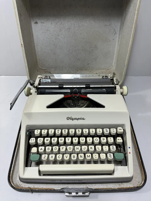 Máquina de escribir Olympia SM8 vintage en estuche