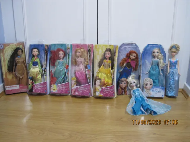 9 Disney Princess dolls:Cinderella;Belle;Aurora;Ariel;Mulan;Pocahontas;Elsa&Anna
