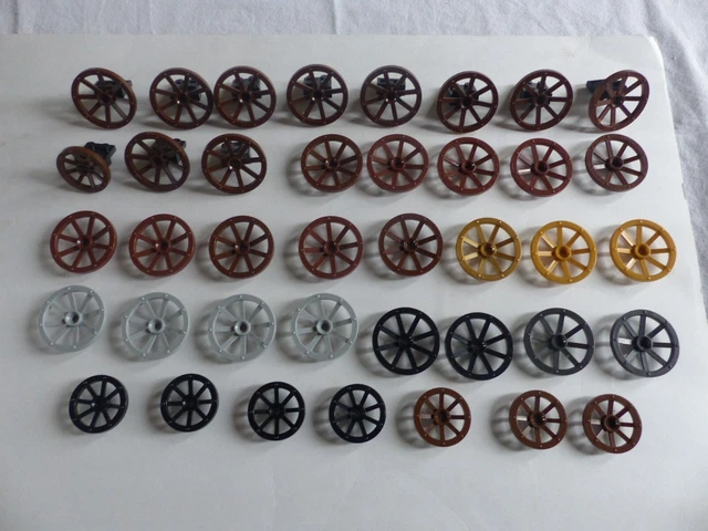 Lego : lot de 39 roue charrette  pour western,château et autre