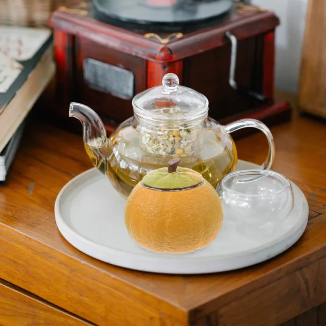 Depósito cerámico sellador multifuncional en vaso de té naranja.