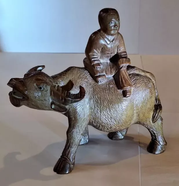 Superb Wood Carving of Water Buffalo Carrying Asian Child Amputee: Stunning