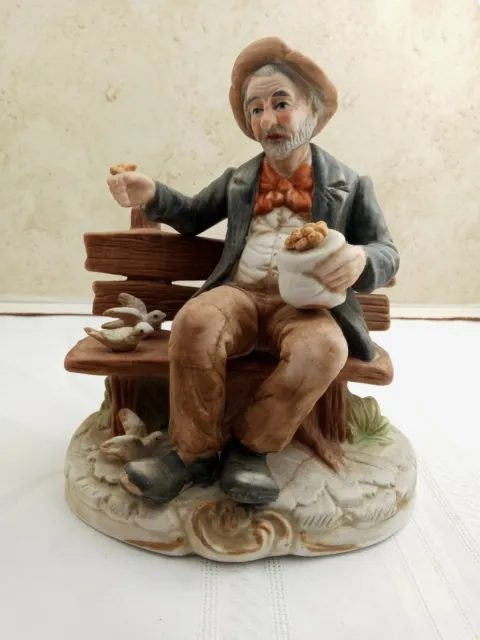 Vintage Ceramic Figurine Elderly Man Sitting on Bench Feeding Birds