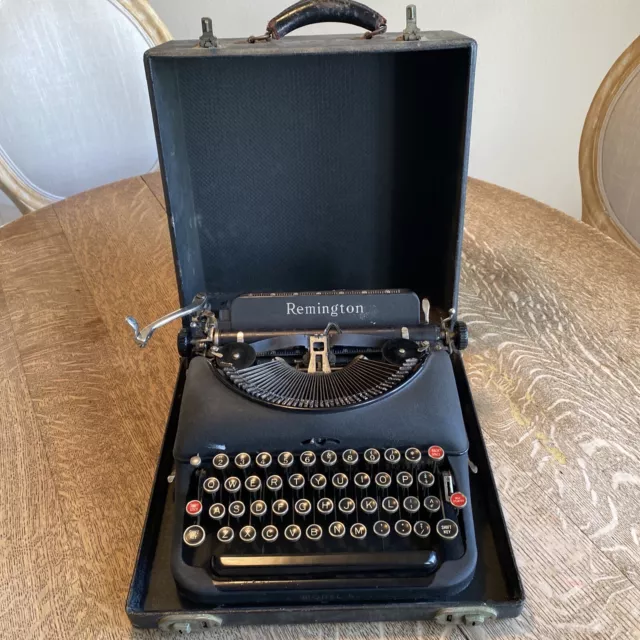 Vintage REMINGTON RAND MODEL 5 Portable TYPEWRITER with carry case