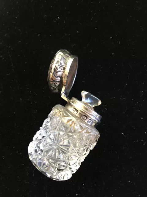 Fine antique silver and glass 19th century glass perfume bottle circa 1885.