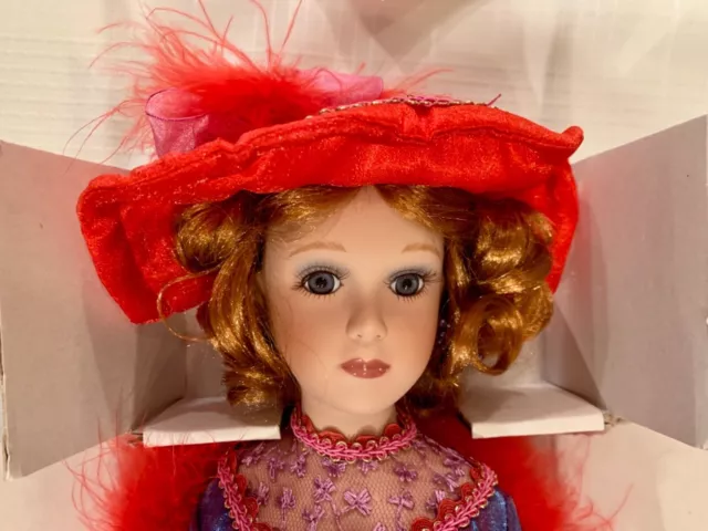 Heritage Signature Collection Porcelain Doll Red Hat