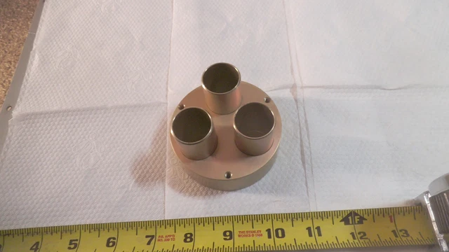 Aluminum disc chromate plated with 3 exhaust ports 2-15/16" OD x 1 " tall