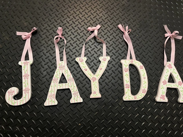 large wooden wall letters with ribbon “jayda” 8-13” high