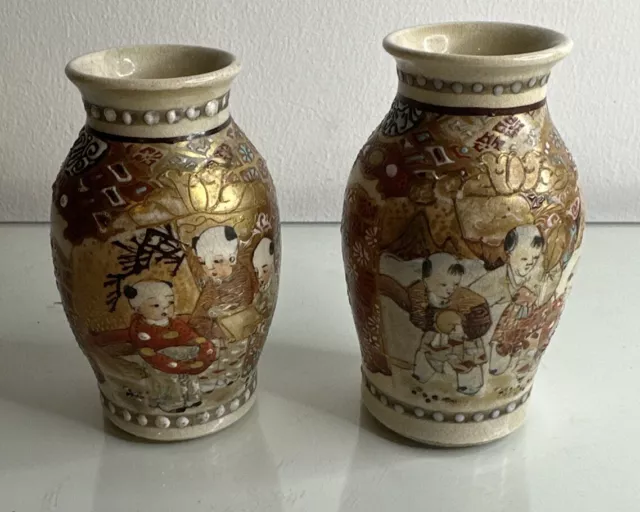 A pair of Japanese Satsuma ? Miniature vases