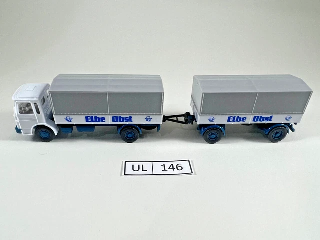 1:87 Mercedes-Benz E-Klasse 300E (W124) Polizei weiß/grün B9 173 - Herpa 4100