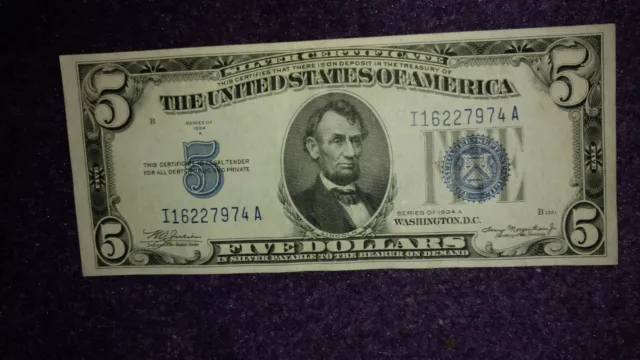 FR-1653 1934 A  $5.00 Silver Certificate. Uncirculated Condition Blue Seal.
