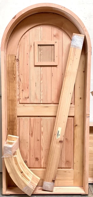 Rustic castle reclaimed lumber arched old growth Doug Fir solid door winery