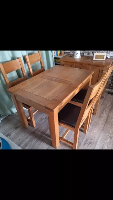 Oak dining table and chairs