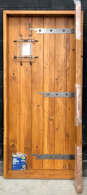 Rustic reclaimed lumber square top door solid wood wine cellar castle iron cage