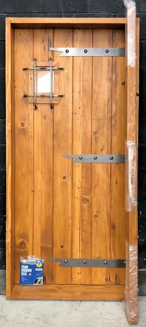 Rustic reclaimed lumber square top door solid wood wine cellar castle iron cage