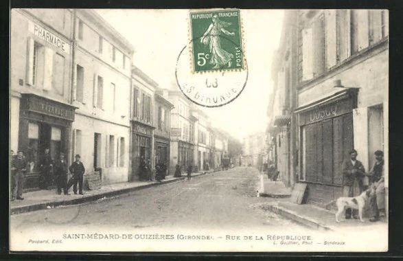 CPA Saint-Médard-de-Guizières, Rue de la République, vue de la rue 1908
