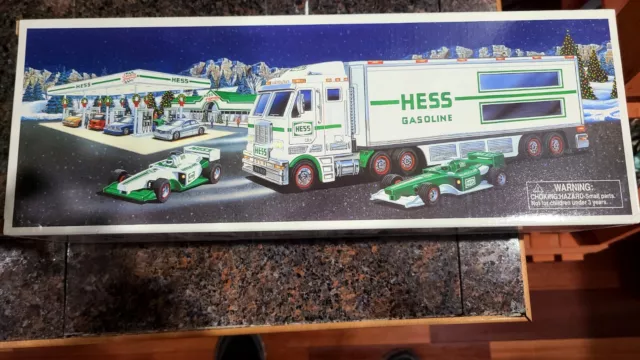 Hess 2003 Toy Truck and Two Race Cars NEW in Original Box Never opened.