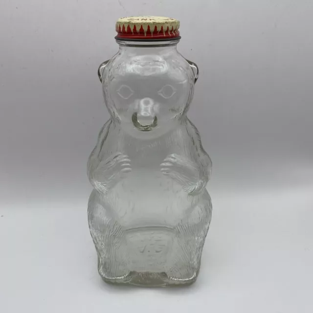Vintage 1950's Snow Crest Beverages Bear Bottle Coin Bank 7” Tall Clear Glass