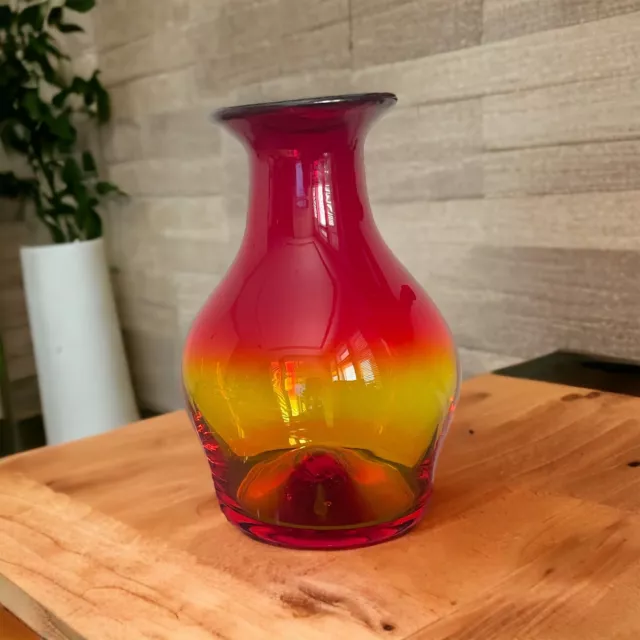 Amberina Blenko “style” vase with a spherical base and a flared round rim