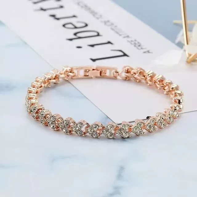 Bracciale romano tempestato di diamanti con cuore in oro rosa