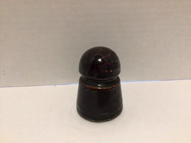 Antique pony style brown porcelain insulator