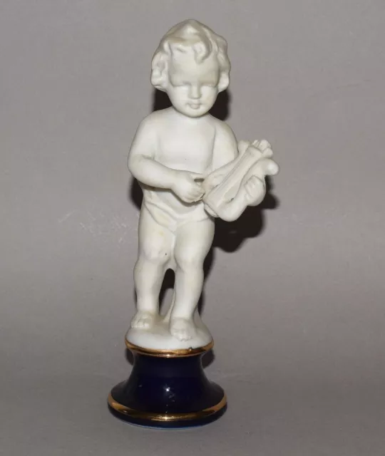 Statue de chérubin ange musicien en biscuit et porcelaine